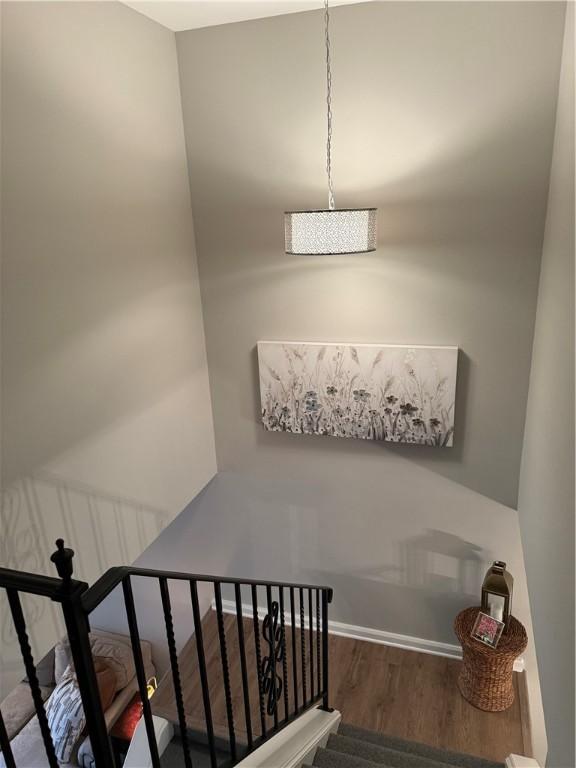 157 New Wickham Dr, Penfield, NY 14526 - stairs featuring wood finished floors