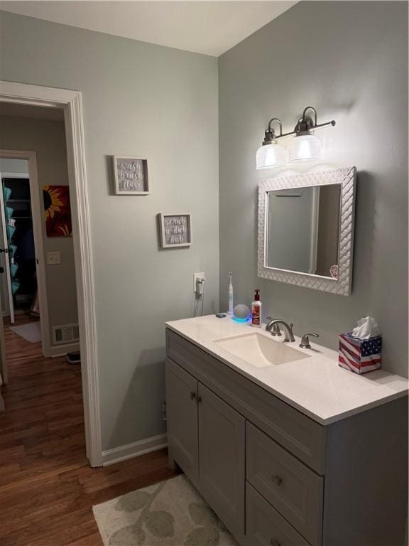 157 New Wickham Dr, Penfield, NY 14526 - bathroom featuring wood finished floors and vanity