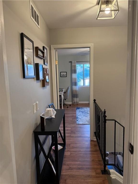 157 New Wickham Dr, Penfield, NY 14526 - corridor with an upstairs landing and dark wood-style floors