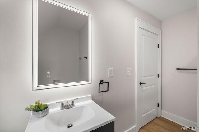 145 14th St, Buffalo, NY 14213 - bathroom with vanity and wood finished floors