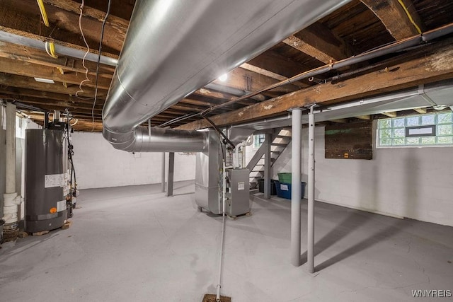 145 14th St, Buffalo, NY 14213 - below grade area featuring gas water heater, stairway, and heating unit