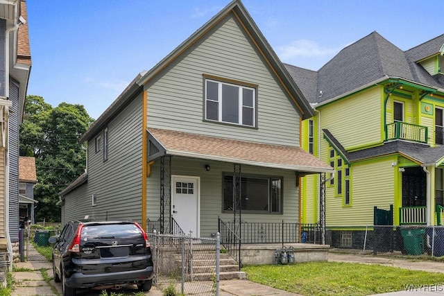 145 14th St, Buffalo, NY 14213 - view of front facade featuring a shingled roof and covered porch