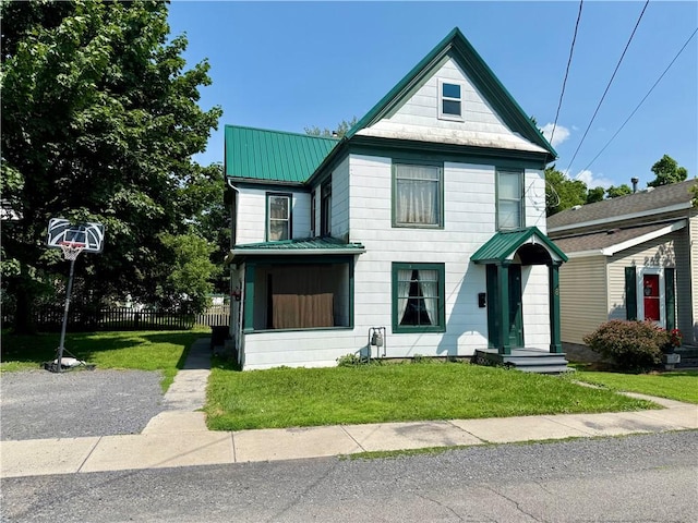8 Church St, Waterloo, NY 13165 - view of front facade with a metal roof