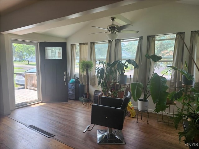 219 Camillus Dr, Camillus, NY 13031 - living area with lofted ceiling, wood finished floors, and ceiling fan