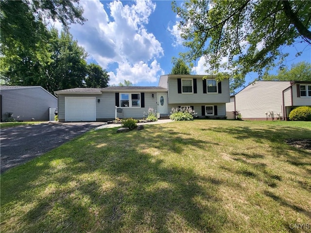 128 Dorando Way, Salina, NY 13090 - tri-level home with asphalt driveway, a garage, and a front yard