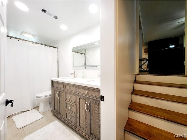 128 Dorando Way, Salina, NY 13090 - bathroom featuring double vanity, tile patterned floors, a shower with curtain, and recessed lighting