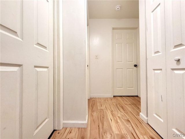 128 Dorando Way, Salina, NY 13090 - hall featuring baseboards and light wood-style floors