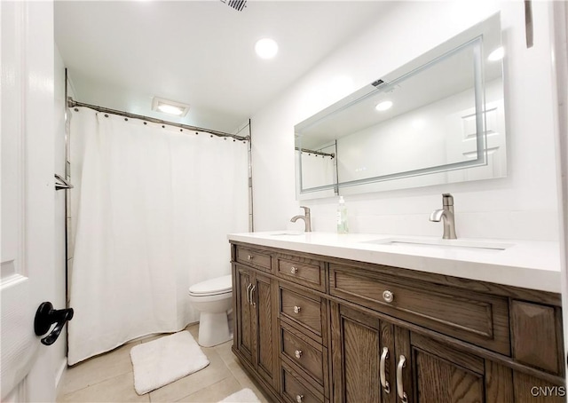 128 Dorando Way, Salina, NY 13090 - bathroom with double vanity, tile patterned floors, and curtained shower