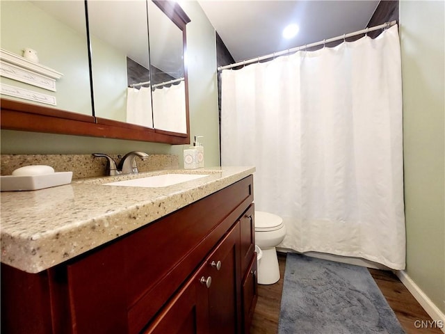 128 Dorando Way, Salina, NY 13090 - bathroom with vanity, wood finished floors, a shower with curtain, and recessed lighting