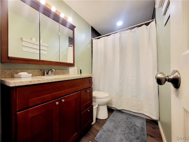 128 Dorando Way, Salina, NY 13090 - full bath with wood finished floors, vanity, and a shower with shower curtain