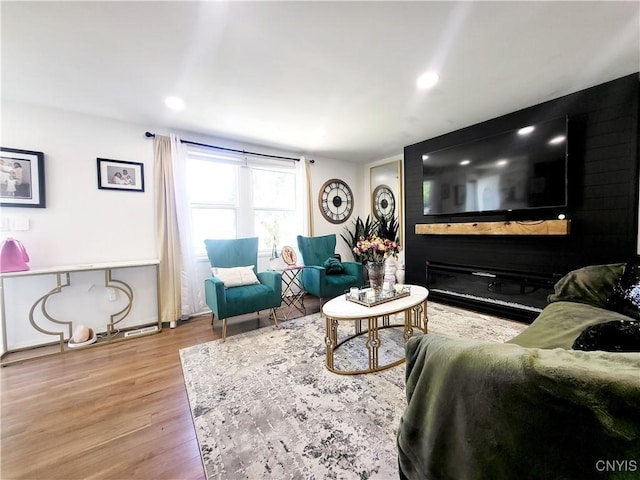 128 Dorando Way, Salina, NY 13090 - living area with wood finished floors and recessed lighting