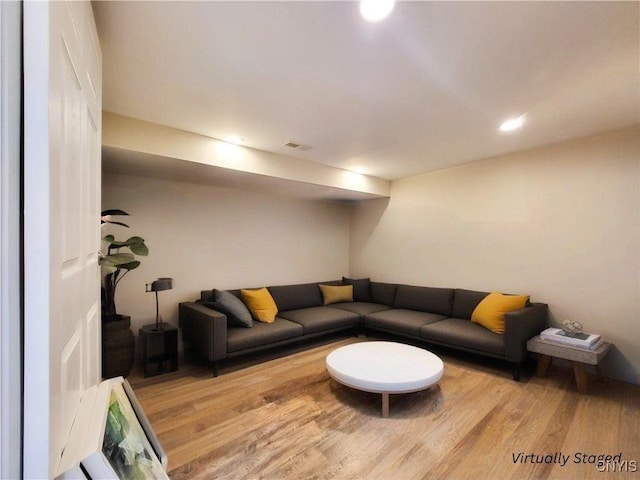128 Dorando Way, Salina, NY 13090 - living area featuring wood finished floors and recessed lighting
