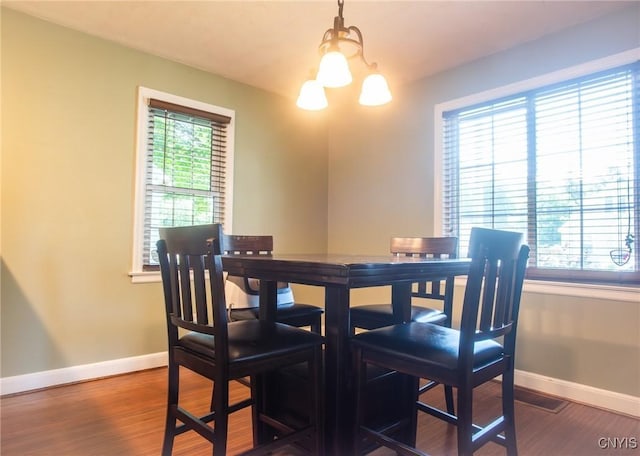 123 Branch St, Deerfield, NY 13502 - dining space featuring dark wood-style floors and a chandelier