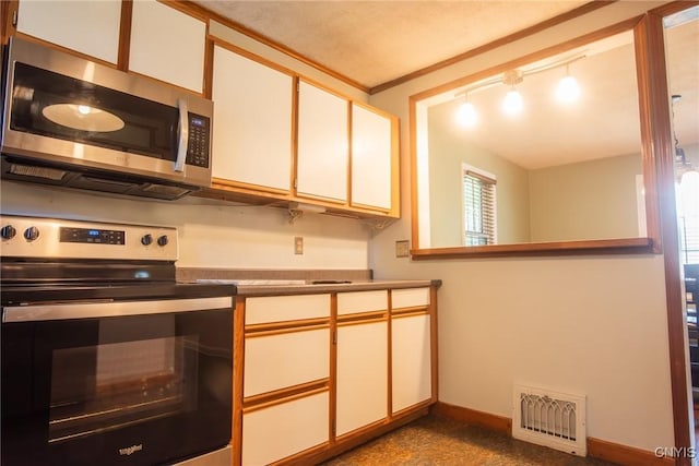 123 Branch St, Deerfield, NY 13502 - kitchen featuring stainless steel appliances and white cabinets