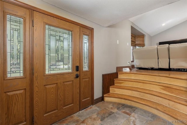 131 Shady Grove Dr, Amherst, NY 14051 - entryway featuring stone finish flooring and vaulted ceiling