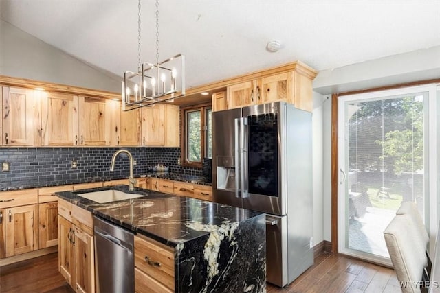 131 Shady Grove Dr, Amherst, NY 14051 - kitchen with appliances with stainless steel finishes, light brown cabinets, a center island with sink, dark wood-style floors, and a chandelier