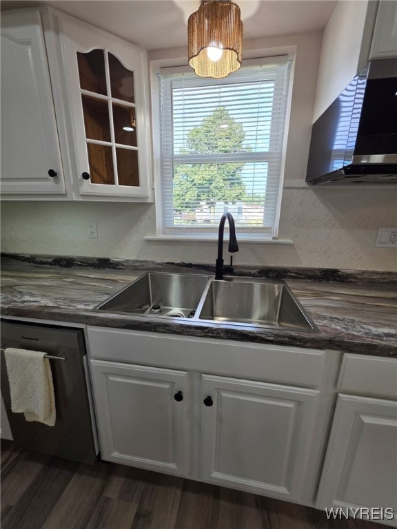 24 Wenonah, Tonawanda, NY 14150 - kitchen featuring extractor fan, dishwashing machine, dark countertops, white cabinets, and glass insert cabinets