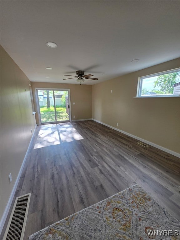 24 Wenonah, Tonawanda, NY 14150 - empty room with healthy amount of natural light, wood finished floors, a ceiling fan, and recessed lighting