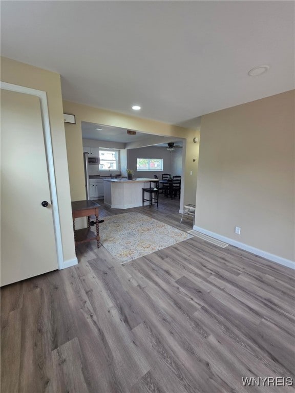 24 Wenonah, Tonawanda, NY 14150 - living area featuring wood finished floors, ceiling fan, and recessed lighting