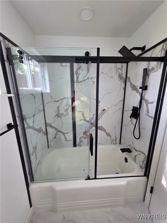24 Wenonah, Tonawanda, NY 14150 - full bathroom with marble look tile flooring and shower / bath combination with glass door