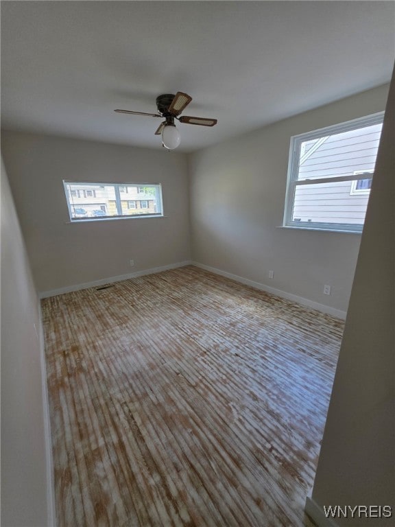 24 Wenonah, Tonawanda, NY 14150 - empty room featuring wood finished floors and a ceiling fan