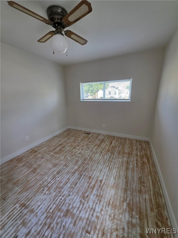 24 Wenonah, Tonawanda, NY 14150 - spare room with wood finished floors and a ceiling fan