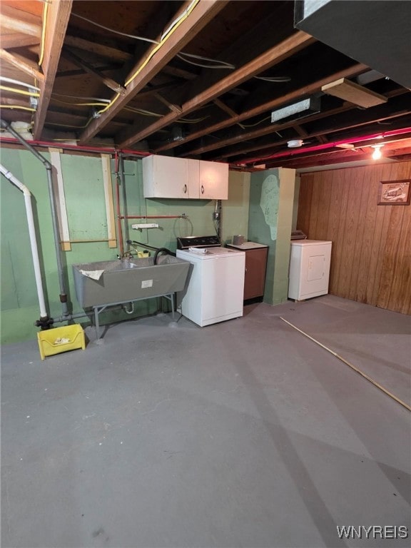 24 Wenonah, Tonawanda, NY 14150 - unfinished below grade area featuring wood walls and washing machine and dryer