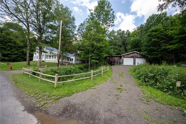 345 Dorr Edson Rd, Milford, NY 13820 - ranch-style house with a garage and an outdoor structure