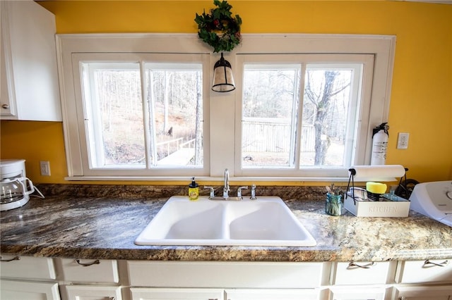 345 Dorr Edson Rd, Milford, NY 13820 - kitchen featuring white cabinetry and plenty of natural light