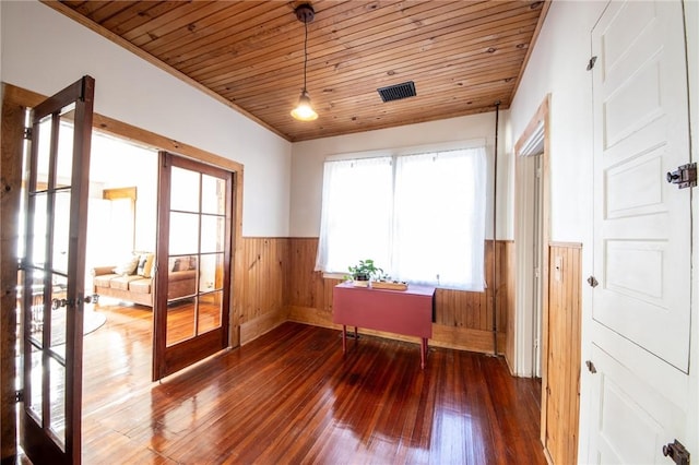 345 Dorr Edson Rd, Milford, NY 13820 - unfurnished room with a wainscoted wall, hardwood / wood-style flooring, wooden ceiling, wood walls, and french doors