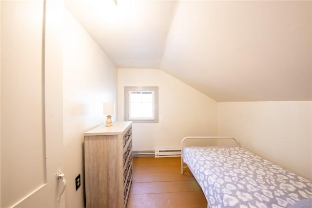 345 Dorr Edson Rd, Milford, NY 13820 - bedroom featuring baseboard heating, lofted ceiling, and wood finished floors