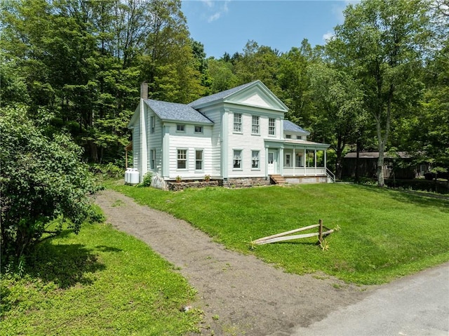 345 Dorr Edson Rd, Milford, NY 13820 - back of house featuring a porch, a chimney, a yard, and roof with shingles