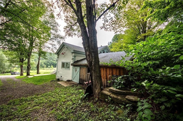 345 Dorr Edson Rd, Milford, NY 13820 - view of side of property featuring a shingled roof