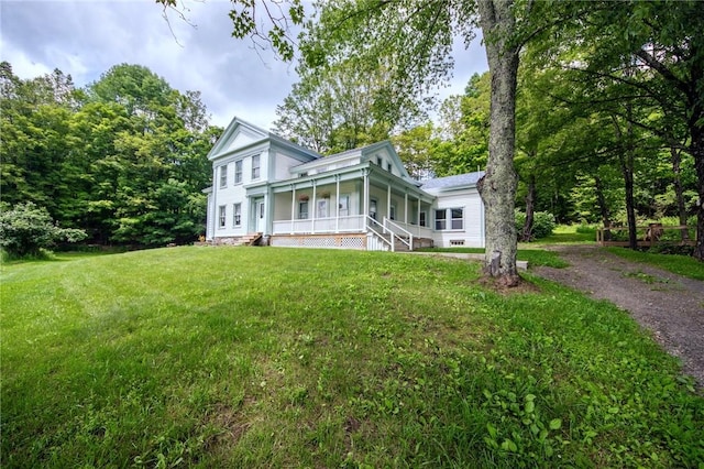 345 Dorr Edson Rd, Milford, NY 13820 - view of front facade featuring a porch, a front lawn, and dirt driveway