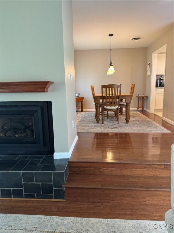 601 Woburn Dr, Camillus, NY 13031 - dining area with wood finished floors and baseboards
