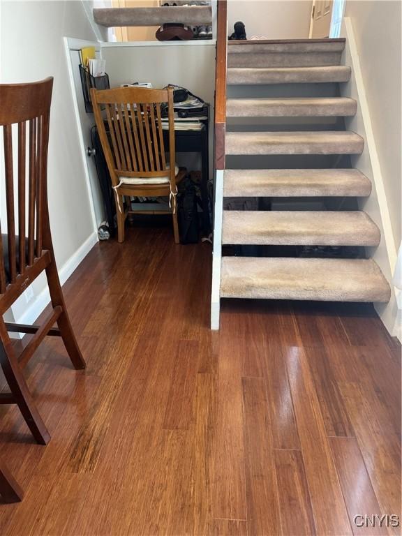 601 Woburn Dr, Camillus, NY 13031 - stairs featuring wood finished floors