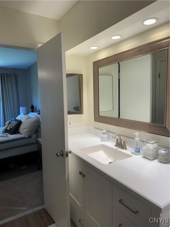 601 Woburn Dr, Camillus, NY 13031 - bathroom with vanity and wood finished floors