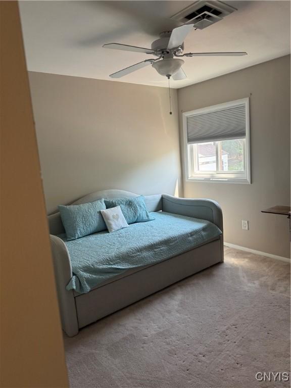 601 Woburn Dr, Camillus, NY 13031 - carpeted bedroom with baseboards and ceiling fan