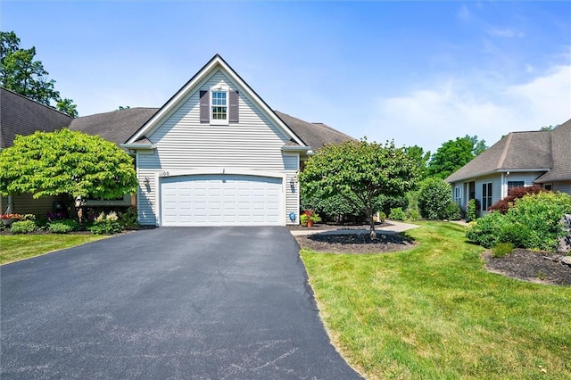 1100 Yorkshire Way, Victor, NY 14564 - view of front of property with driveway, a front yard, and an attached garage
