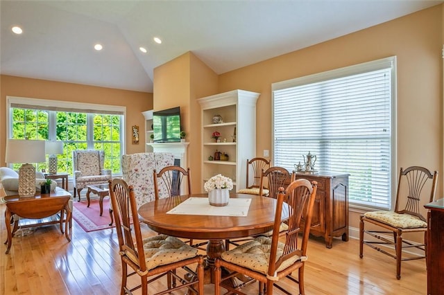 1100 Yorkshire Way, Victor, NY 14564 - dining space with light wood finished floors, lofted ceiling, and recessed lighting
