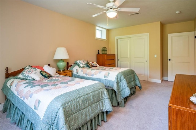 1100 Yorkshire Way, Victor, NY 14564 - bedroom with light carpet, a closet, and ceiling fan