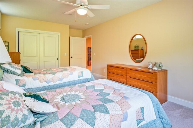 1100 Yorkshire Way, Victor, NY 14564 - bedroom with carpet flooring, a closet, and a ceiling fan