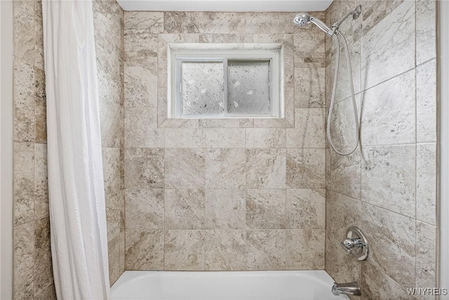 87 Ermann Dr, Tonawanda, NY 14217 - bathroom featuring shower / tub combo with curtain