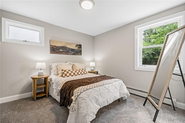 87 Ermann Dr, Tonawanda, NY 14217 - carpeted bedroom featuring a baseboard heating unit and baseboards