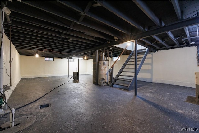 87 Ermann Dr, Tonawanda, NY 14217 - basement featuring water heater and stairway