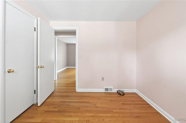 215 Rebecca St, Clay, NY 13212 - washroom featuring light wood-style flooring and baseboards