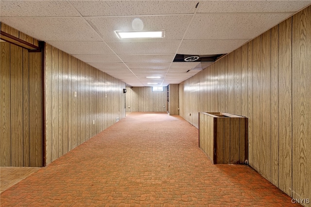 215 Rebecca St, Clay, NY 13212 - corridor with carpet flooring, wood walls, and a drop ceiling