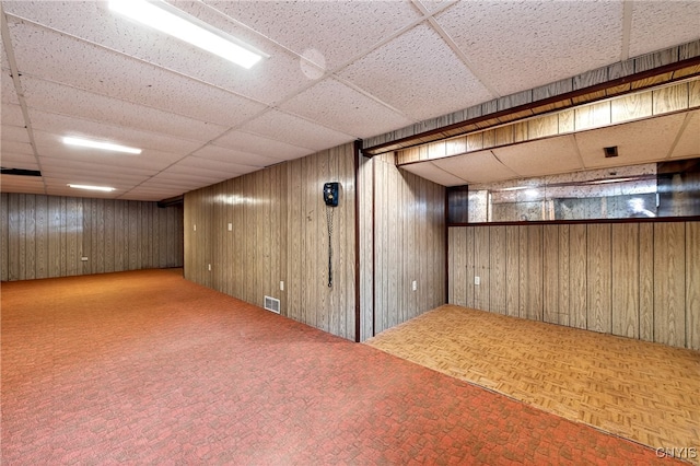 215 Rebecca St, Clay, NY 13212 - finished below grade area featuring wood walls and a drop ceiling