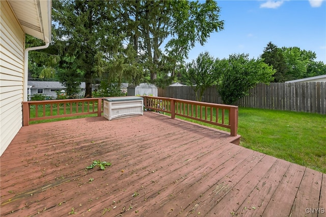 215 Rebecca St, Clay, NY 13212 - wooden terrace featuring a storage unit and a fenced backyard