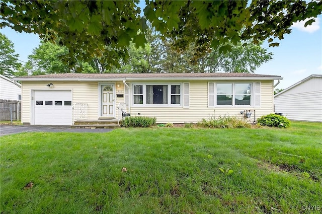 215 Rebecca St, Clay, NY 13212 - ranch-style home with an attached garage, driveway, and a front yard